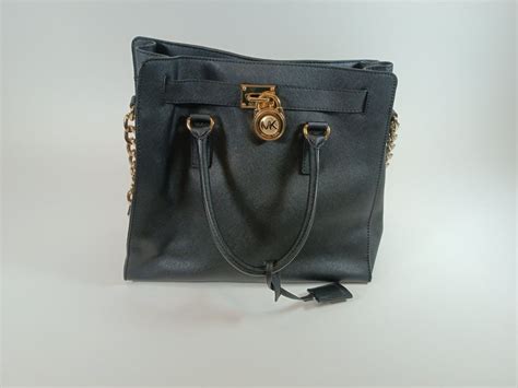 michael kors tasche schwarz gold